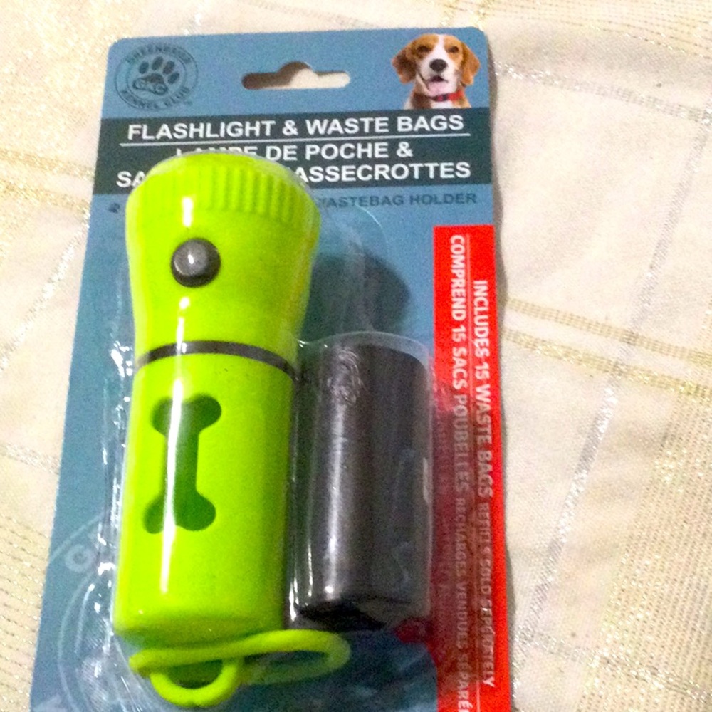 Flashlight and waste bag